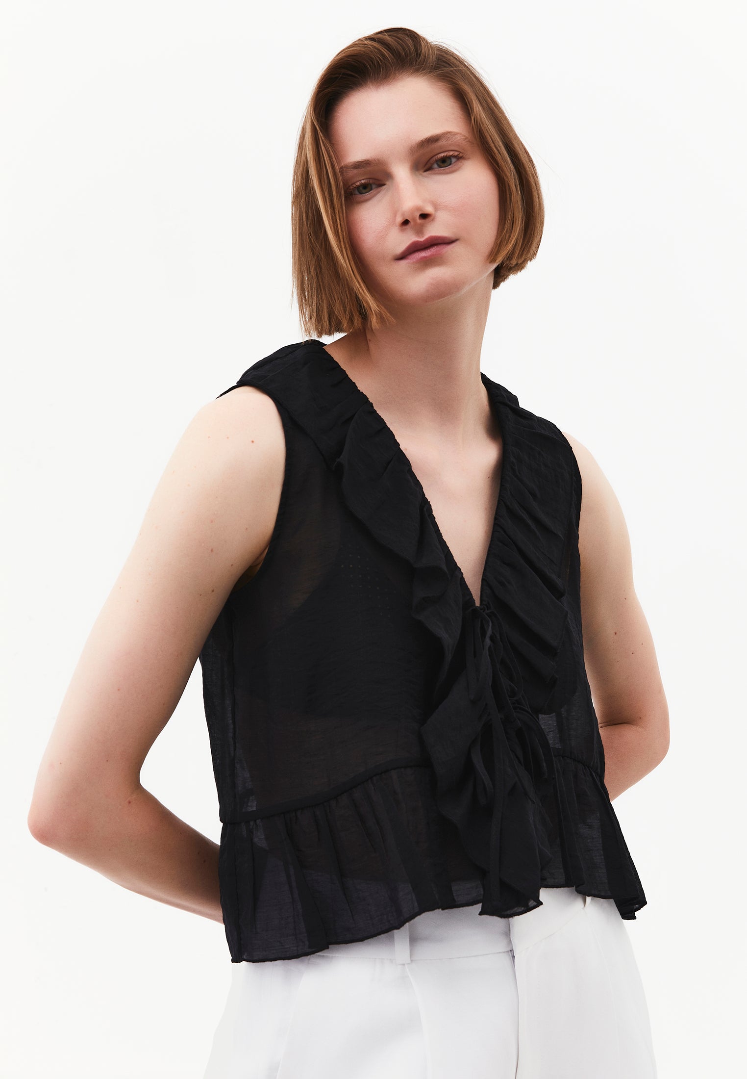 Sleeveless Blouse With Ruffle Detail And V Neckline - BLACK