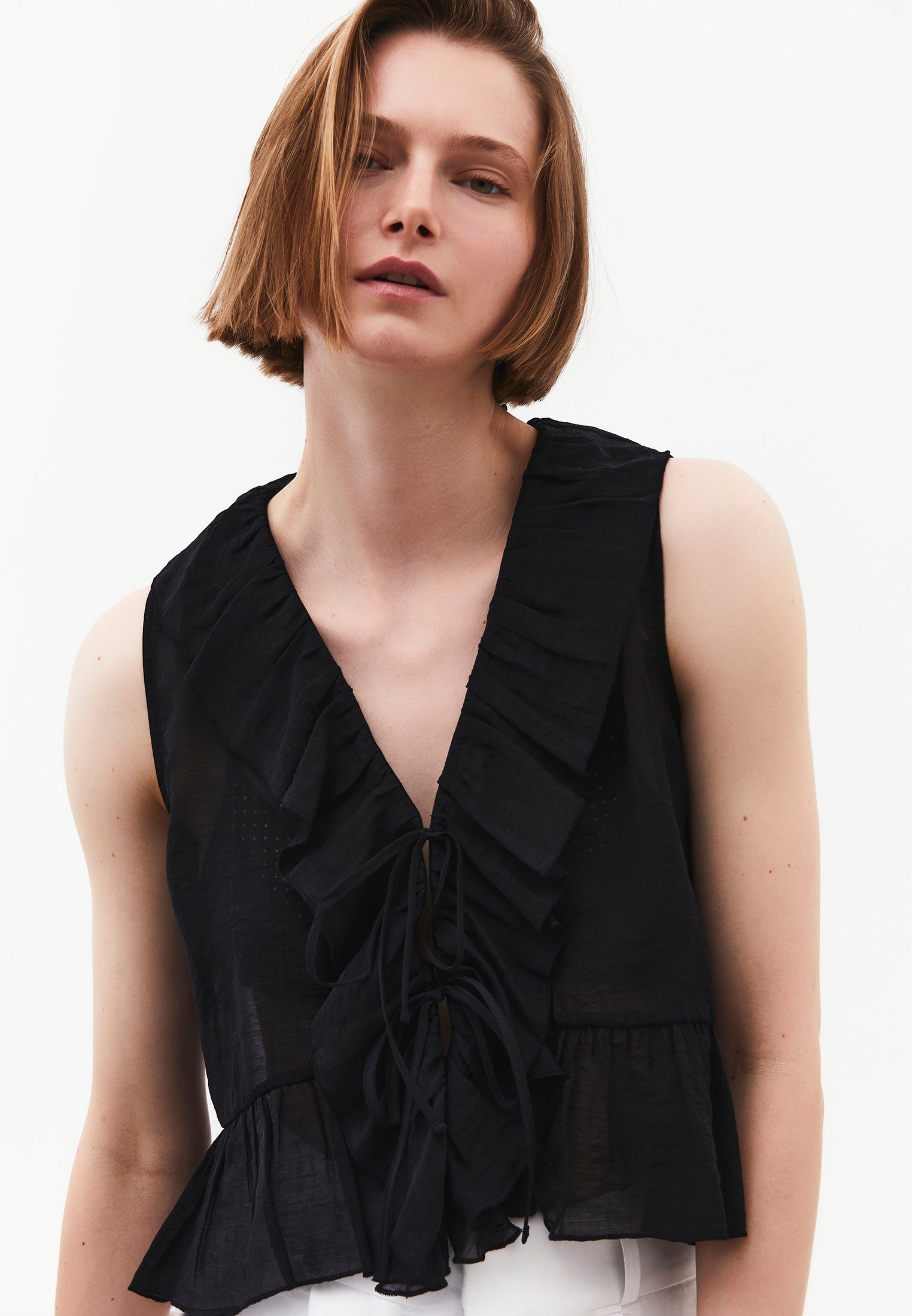 Sleeveless Blouse With Ruffle Detail And V Neckline - BLACK