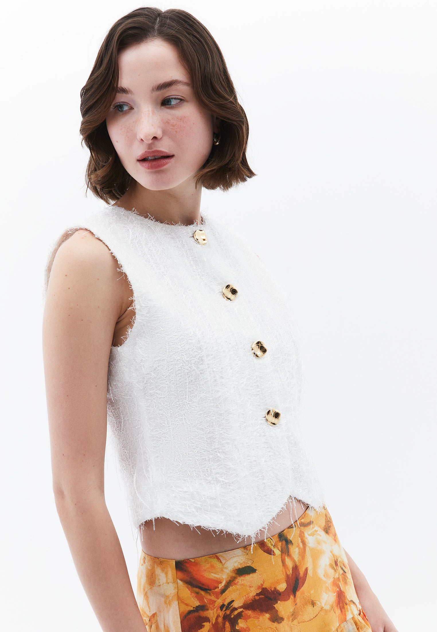 Sleeveless Vest With Button And Tassel Details - WHITE